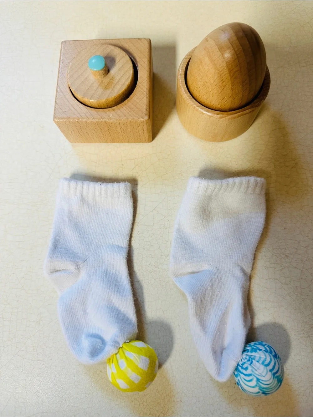 Lovevery White rattle Play Socks, Egg Cup, and Pincer Puzzle Bundle
